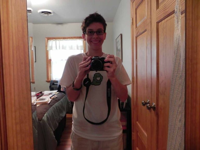 Wearing the completed costume, taking a selfie in the mirror.