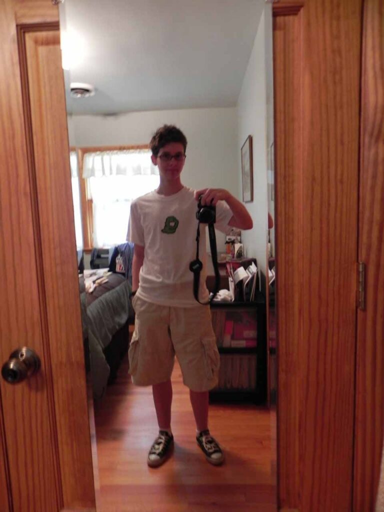 Wearing the completed costume, taking a selfie in the mirror.