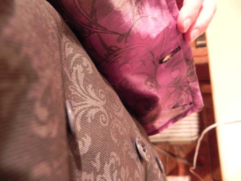 Close-up of the jacket inner lining and buttons.