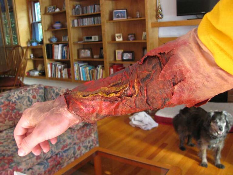 The finished armsleeve, made to look like the flesh is rotted and torn down to the layer beneath.