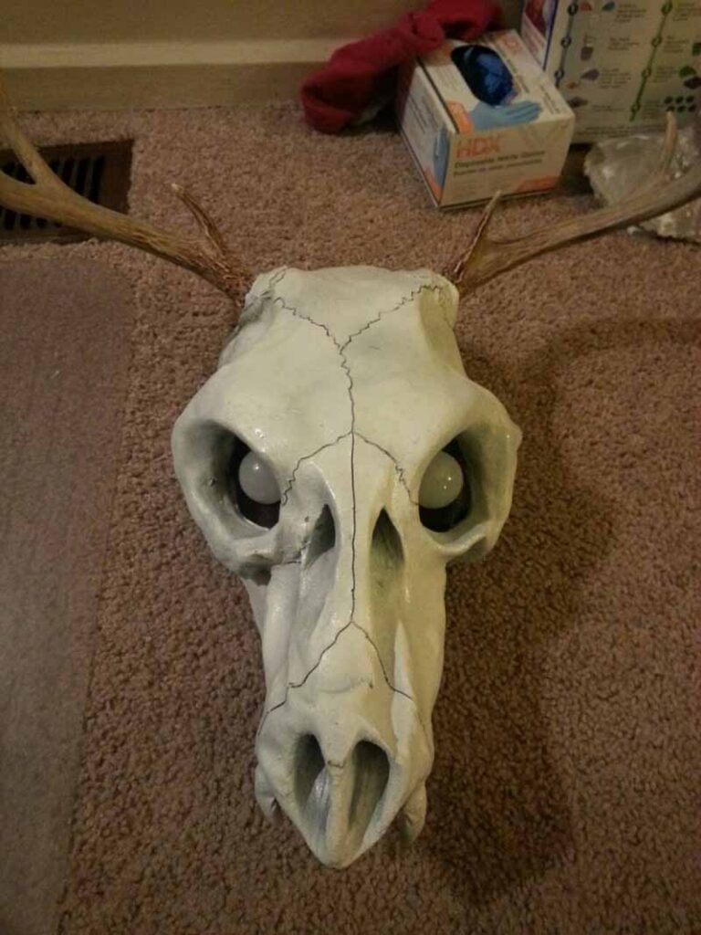 The completed skull, with antlers and LED eyes.