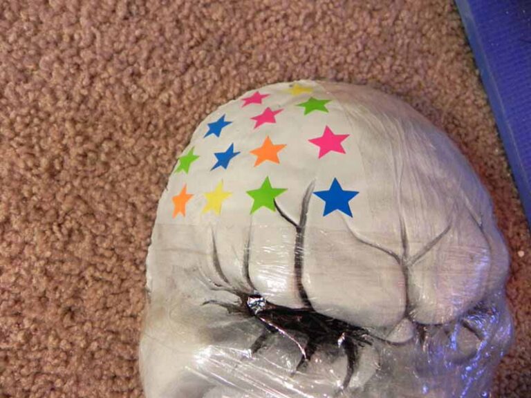Painting the resin mask and adding details.