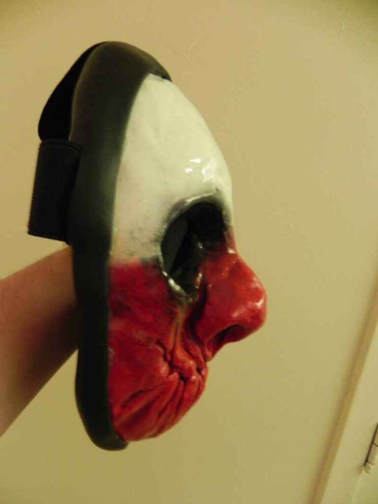The finished mask, with elastic straps and rubber seal applied around the outer edge.