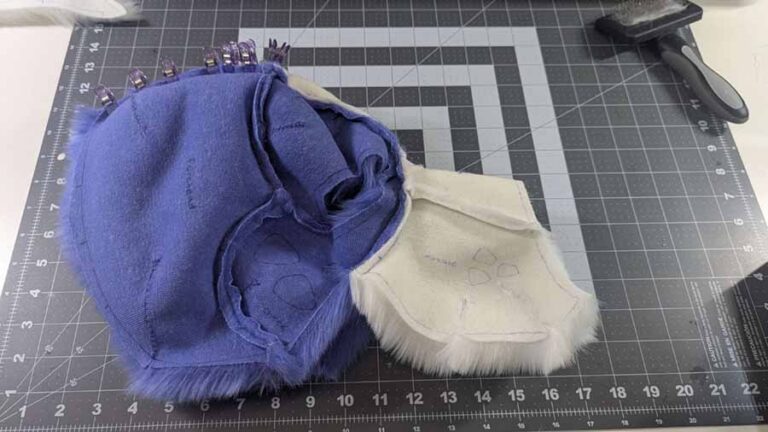 The fur pieces of the head in progress, being sewn together.