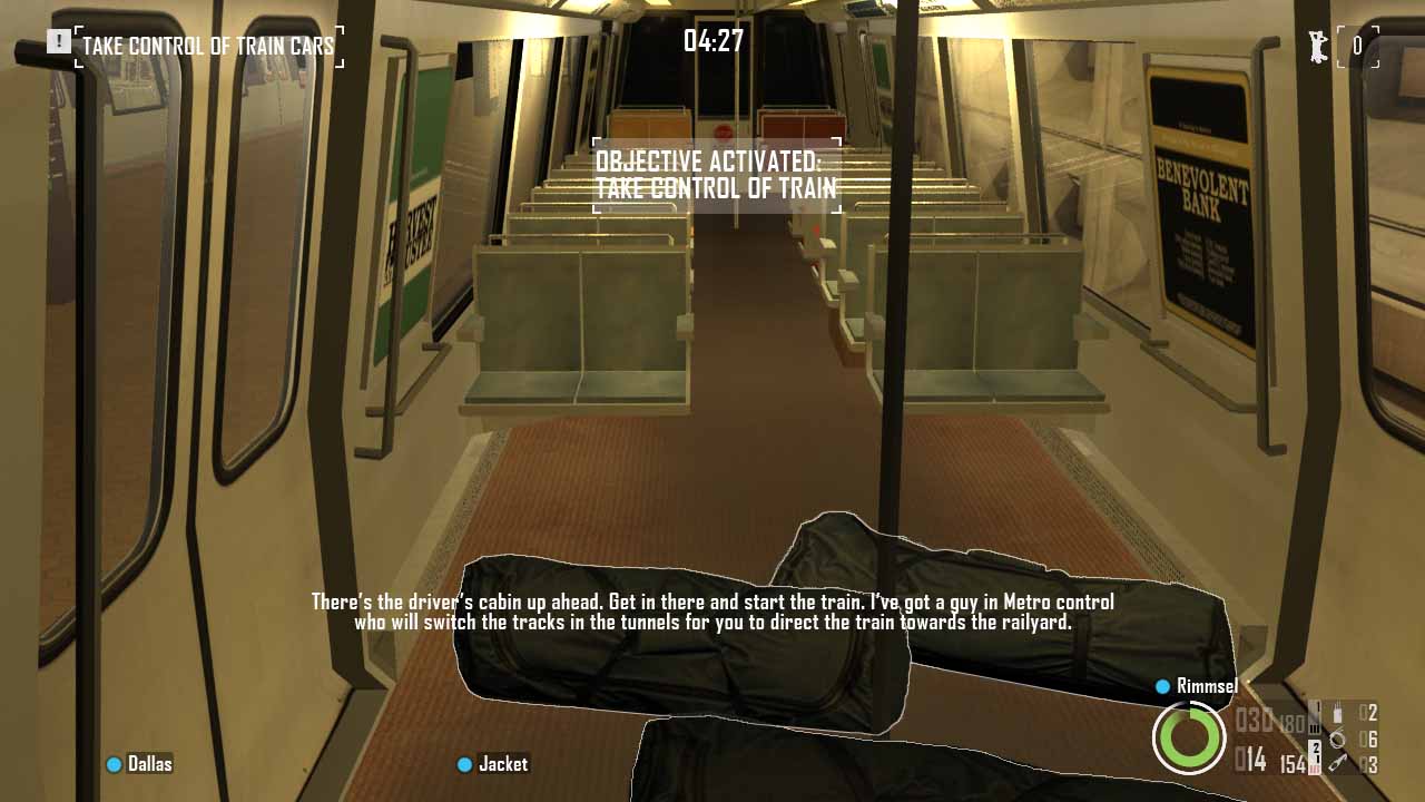 Interior of the metro train car, with bags of cash on the floor. Bain's text reads, "There's the driver's cabin up ahead. Get in there and start the train. I've got a guy in Metro control who will switch the tracks in the tunnels for you to direct the train towards the railyard."